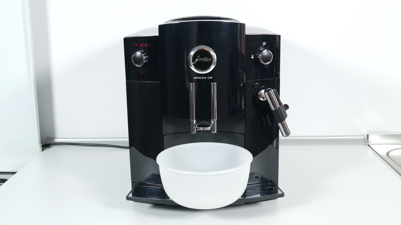 Reinigung der Jura Impressa C60 Kaffeemaschine anhand Reinigungstabletten